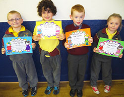 Students receive their Student of the Month Awards.